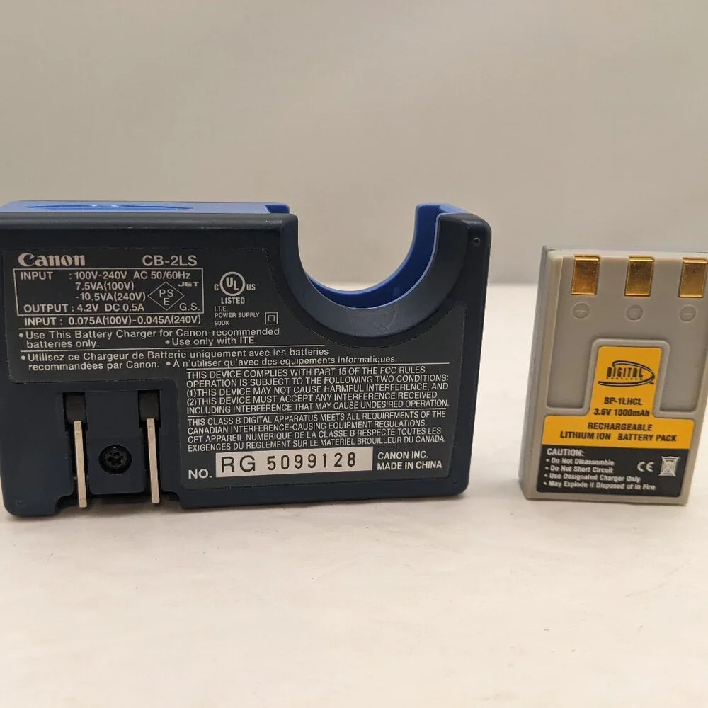 CANON CB-2LS Charger & Digital Concepts BP-1LHCL Rechargeable Li-Ion Pack USED